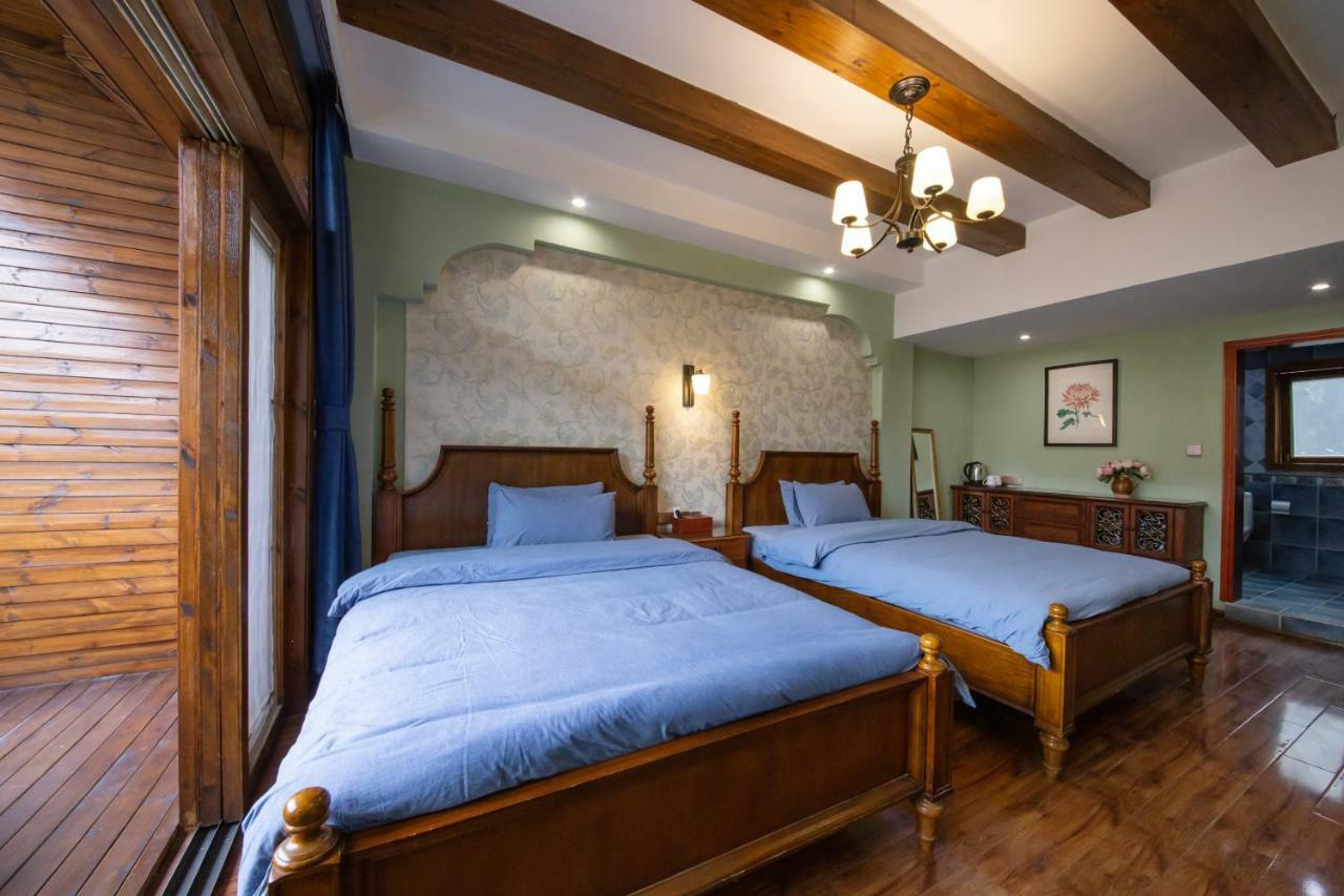 Flower Time Inn Fenghuang Extérieur photo